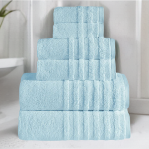 Soft white SaaSoh Opulent Collection bath towels folded neatly, showcasing plush texture and luxurious quality.
