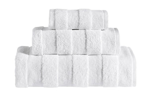 White SaaSoh Apogee Collection luxury bath towel laid flat, showcasing soft, plush fabric and elegant design for spa-like comfort.
