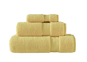 Set of three SaaSoh Klassic Collection bath towels in vibrant lemon yellow, showing soft, plush fabric and textured design.